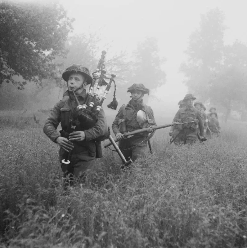 Led by their piper, men of the 7th Seaforth Highlanders, 15th (Scottish) Infantry Division advance during Operation Epsom, 26 June 1944. Led by their piper, men of the 7th Seaforth Highlanders, 15th (Scottish) Infantry Division advance during Operation Epsom, 26 June 1944.